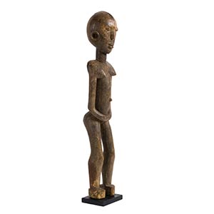 A WOODEN FIGURE OF A STANDING FEMALE ... 