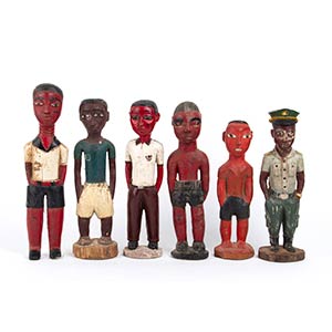 SIX PAINTED WOOD SCULPTURES OF COLON MALE ... 