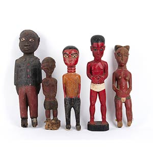 FIVE PAINTED WOOD SCULPTURES OF COLON MALE ... 