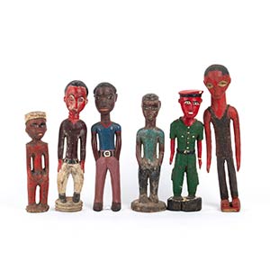SIX PAINTED WOOD SCULPTURES OF COLON MALE ... 