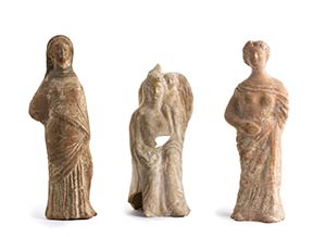 Group of three terracotta Tanagra statuettes ... 