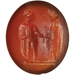 Carnelian Intaglio with a togated clasping ... 