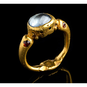 Gold finger ring with aquamarine and garnets ... 