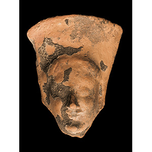Head of a terracotta kore in Daedalic style ... 
