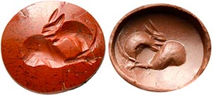 A roman red jasper intaglio. A rodent eating ... 
