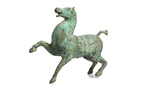 AN ARCHAIC BRONZE MODEL OF A HORSE China, ... 