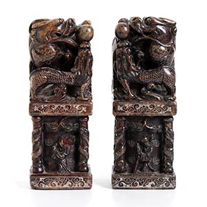 A PAIR OF CARVED HARDSTONE SEALS ... 