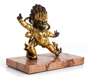 A GILT AND PAINTED BRONZE YAMA ... 