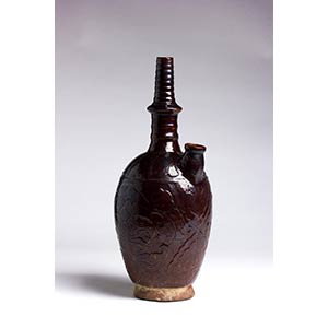 A RUSSET-BROWN-GLAZED CERAMIC WATER ... 