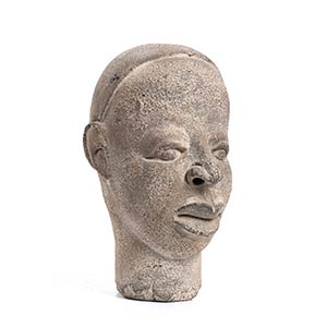 A STONE HEAD Africa  22 cm high  Provenance: ... 