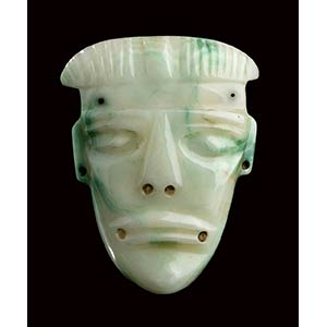 A WHITE AND GREEN JADE MASK Olmec style  11 ... 