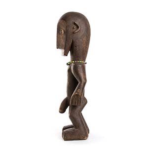 A WOOD AND BEADS FIGURE Africa  57 ... 