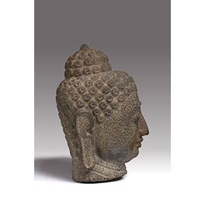 A LARGE ANDESITE HEAD OF BUDDHA ... 