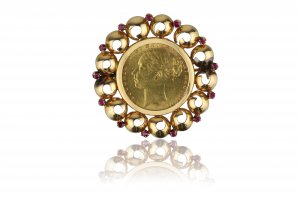 Coin brooch  Yellow gold brooch with central ... 