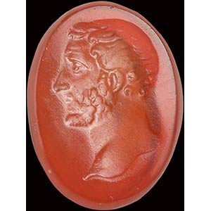 A pinkish glass impression. Bust of the ... 