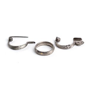 Couple of Greek silver fibulae and a ring, ... 