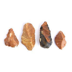 Collection of four Paleolithic flint blades; ... 