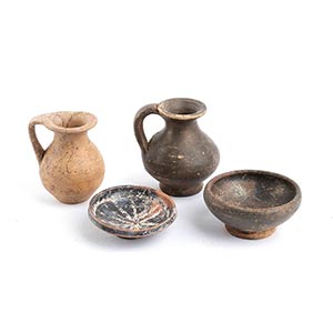 Collection of four Etruscan black-glazed ... 