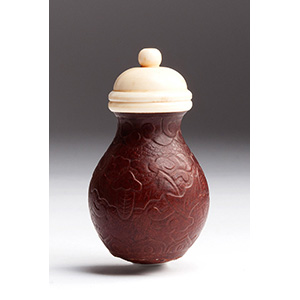 Carved fruit seed and Ivory snuff bottle;
XX ... 
