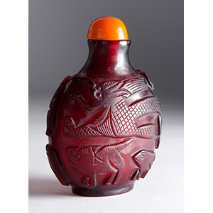 Carved synthetic resin snuff bottle; 
XX ... 