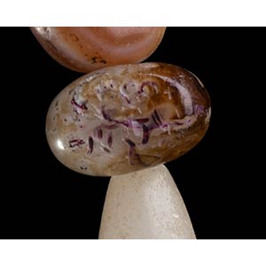 A STONE BEADS, SOME INCISED WITH ... 