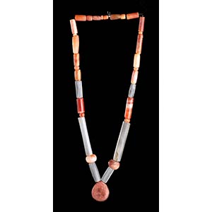 A CARNELIAN AND QUARTZ BEADS NECKLACE WITH ... 