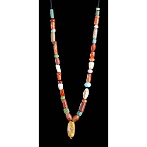 A STONE, FAIENCE AND GLASS BEADS NECKLACE ... 