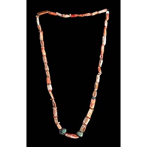 A CARNELIAN AND POTTERY BEADS NECKLACElabel: ... 