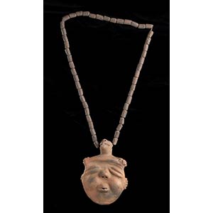 AN INCISED POTTERY BEADS NECKLACE ... 