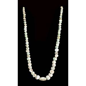 A CALCIFIED STONE BEADS NECKLACE56 ... 