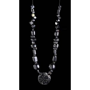 A SHUNGITE BEADS NECKLACE WITH INCISED ... 