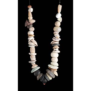 A POTTERY, STONE AND CONCHSHELL BEADS ... 