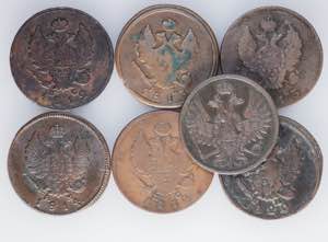 A containing 7 Russian copper coins. ... 