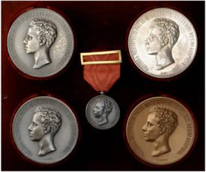 1902. Alfonso XIII. Conjunto de 4 medallas ... 